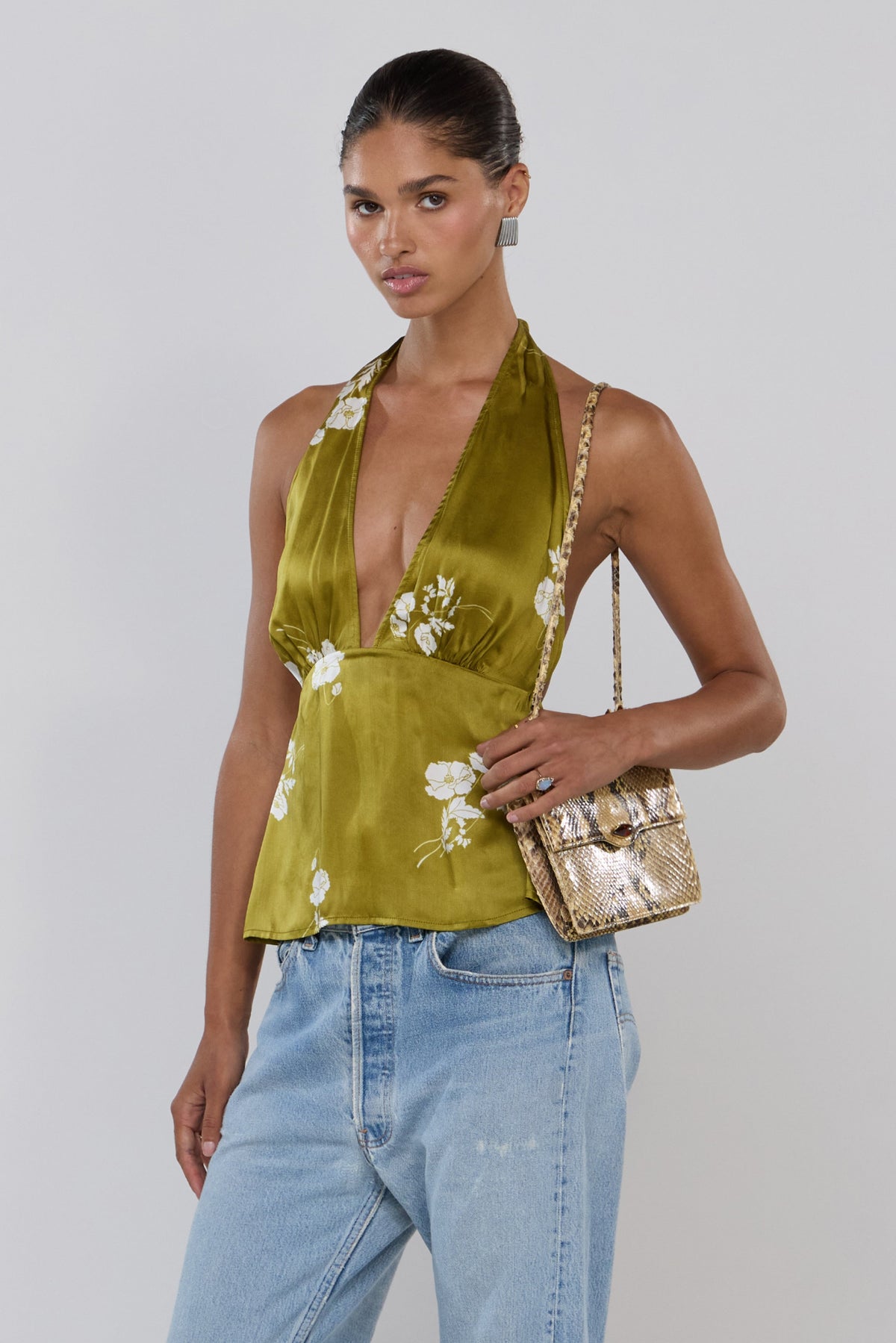 This is an image of Yume in Moss - RESA featuring a model wearing the dress