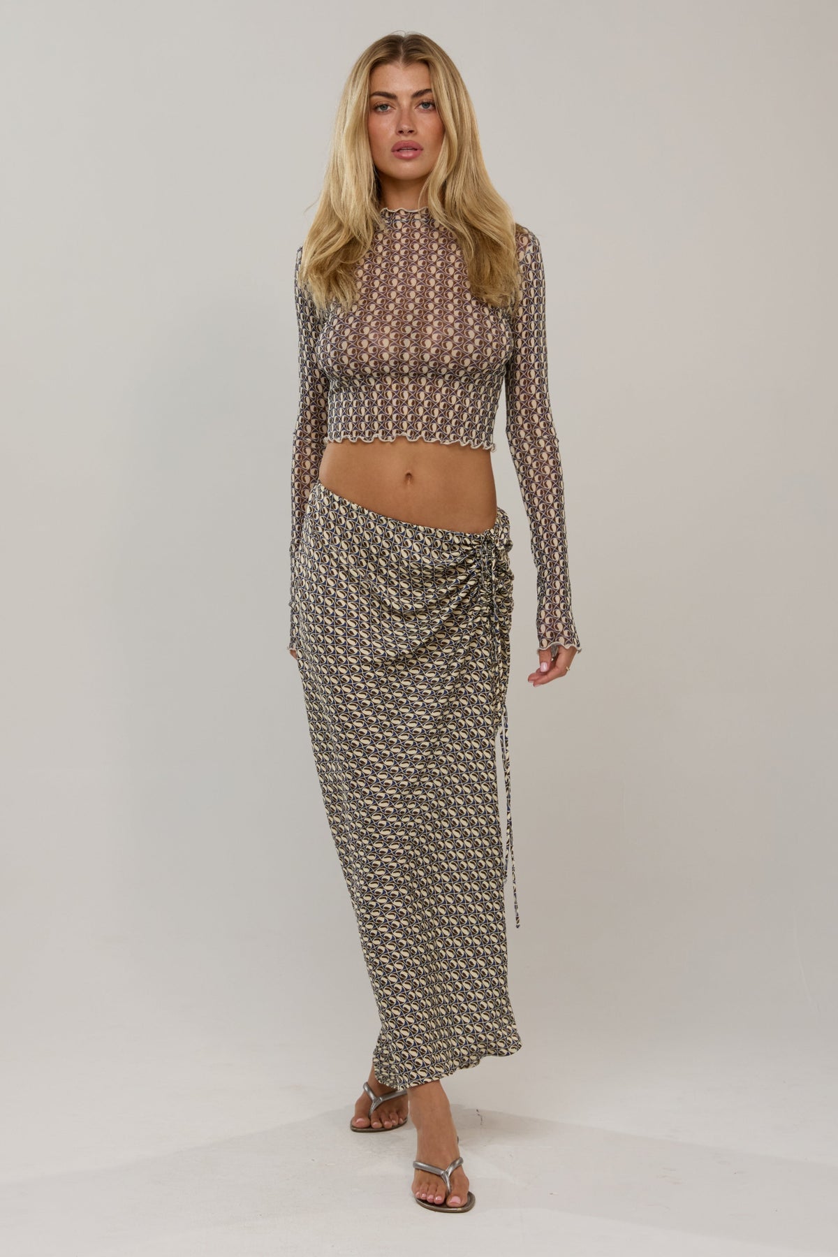 This is an image of Ziggy in Prism - RESA featuring a model wearing the dress