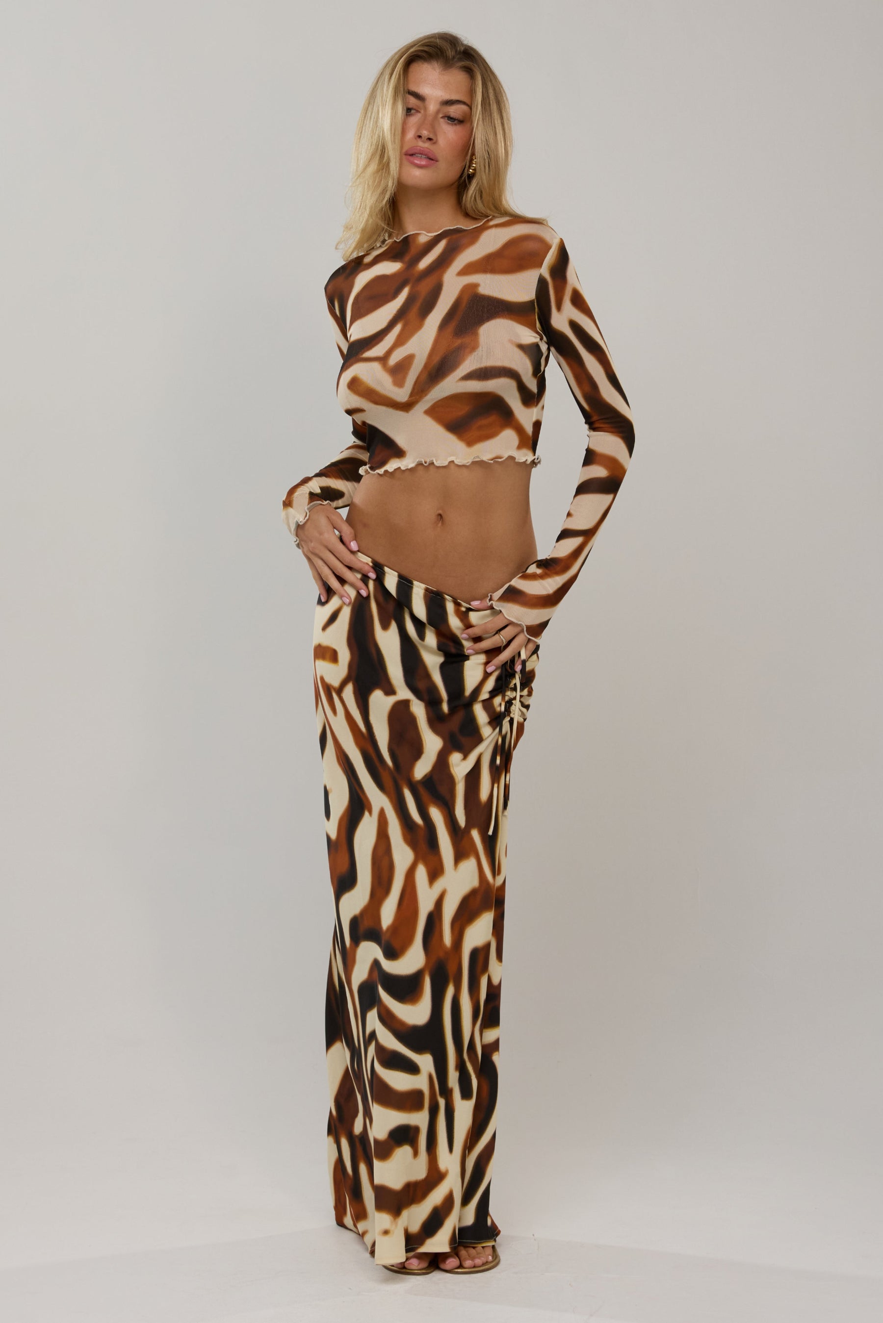 This is an image of Ziggy in Rye - RESA featuring a model wearing the dress