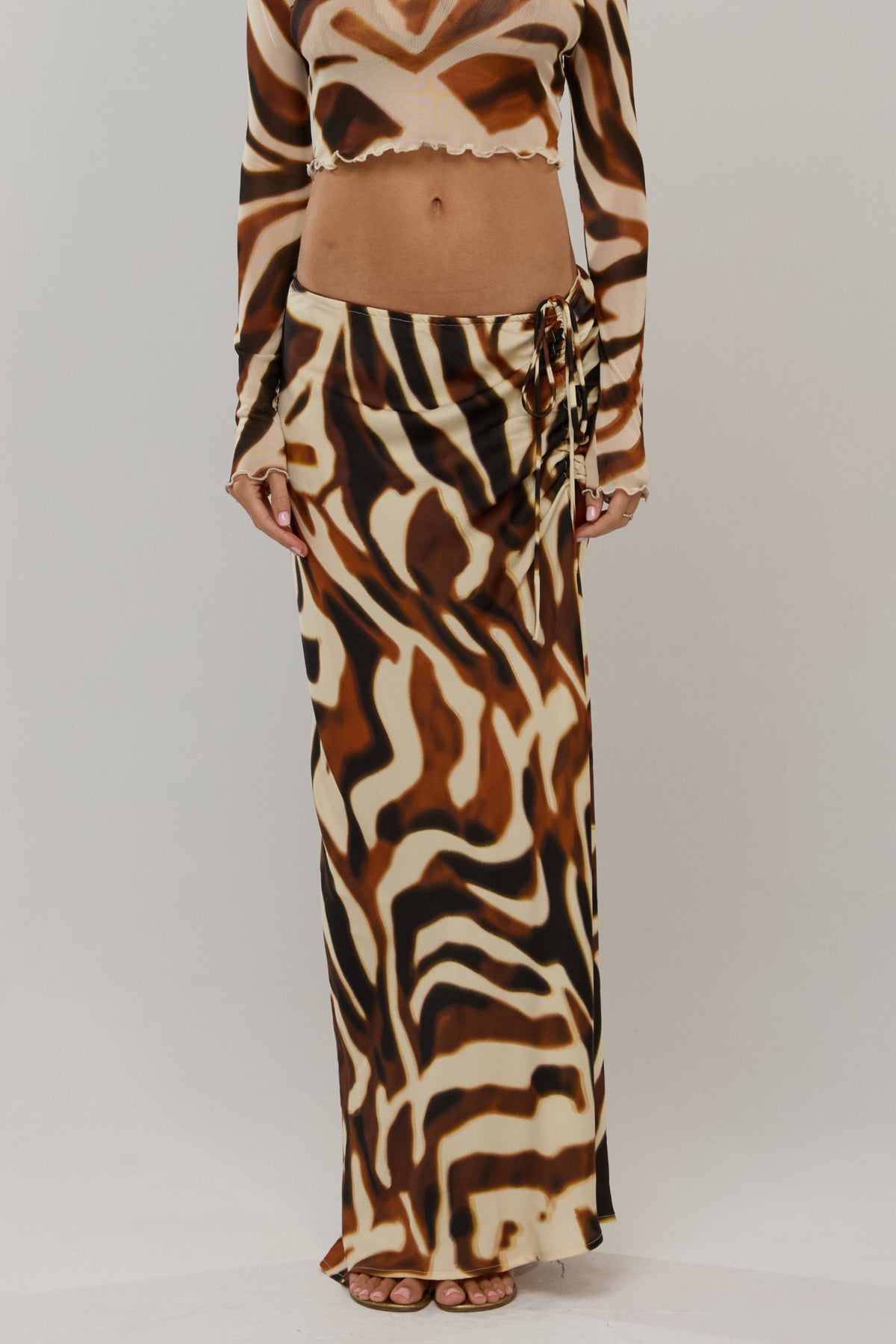 This is an image of Ziggy in Rye - RESA featuring a model wearing the dress