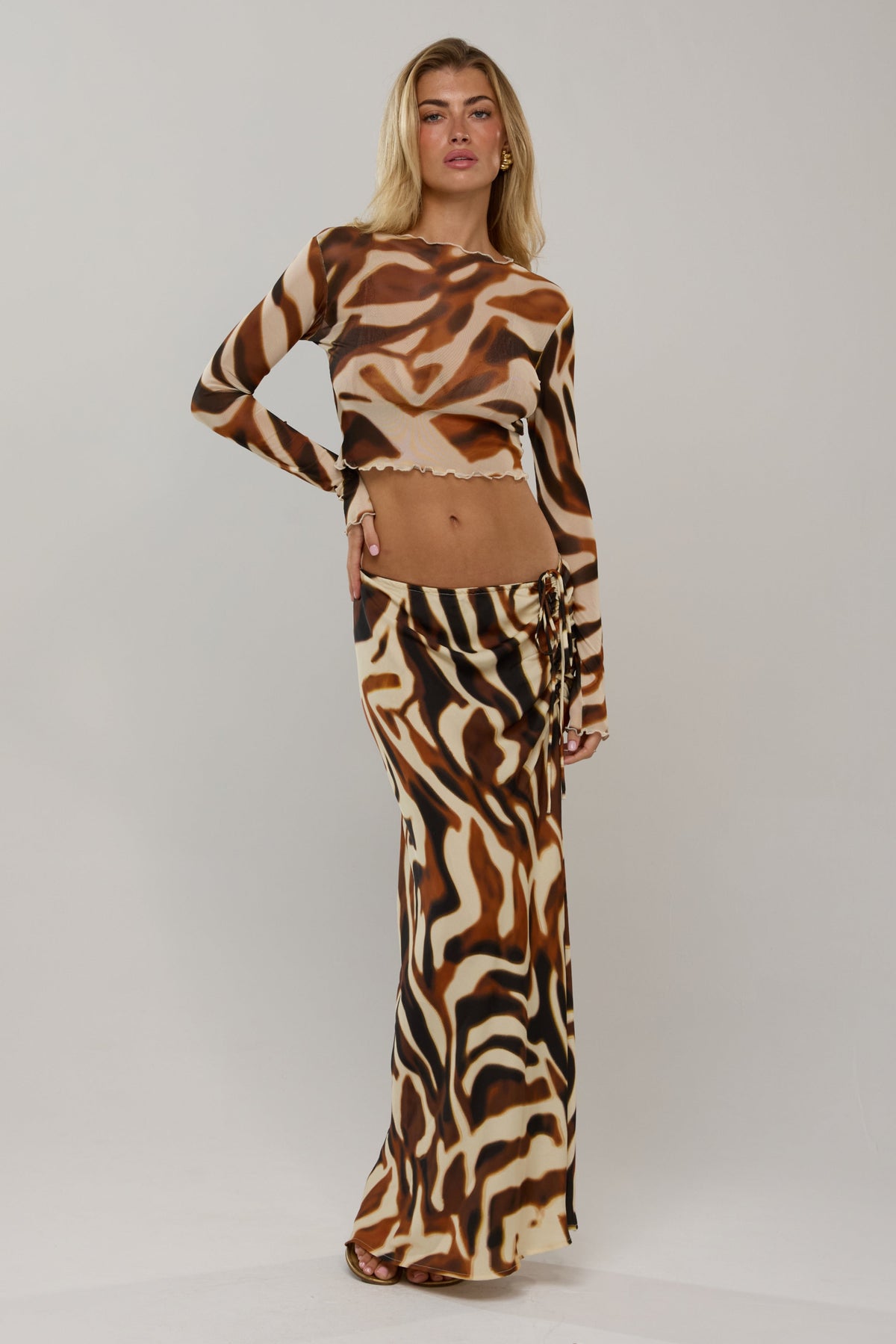 This is an image of Ziggy in Rye - RESA featuring a model wearing the dress