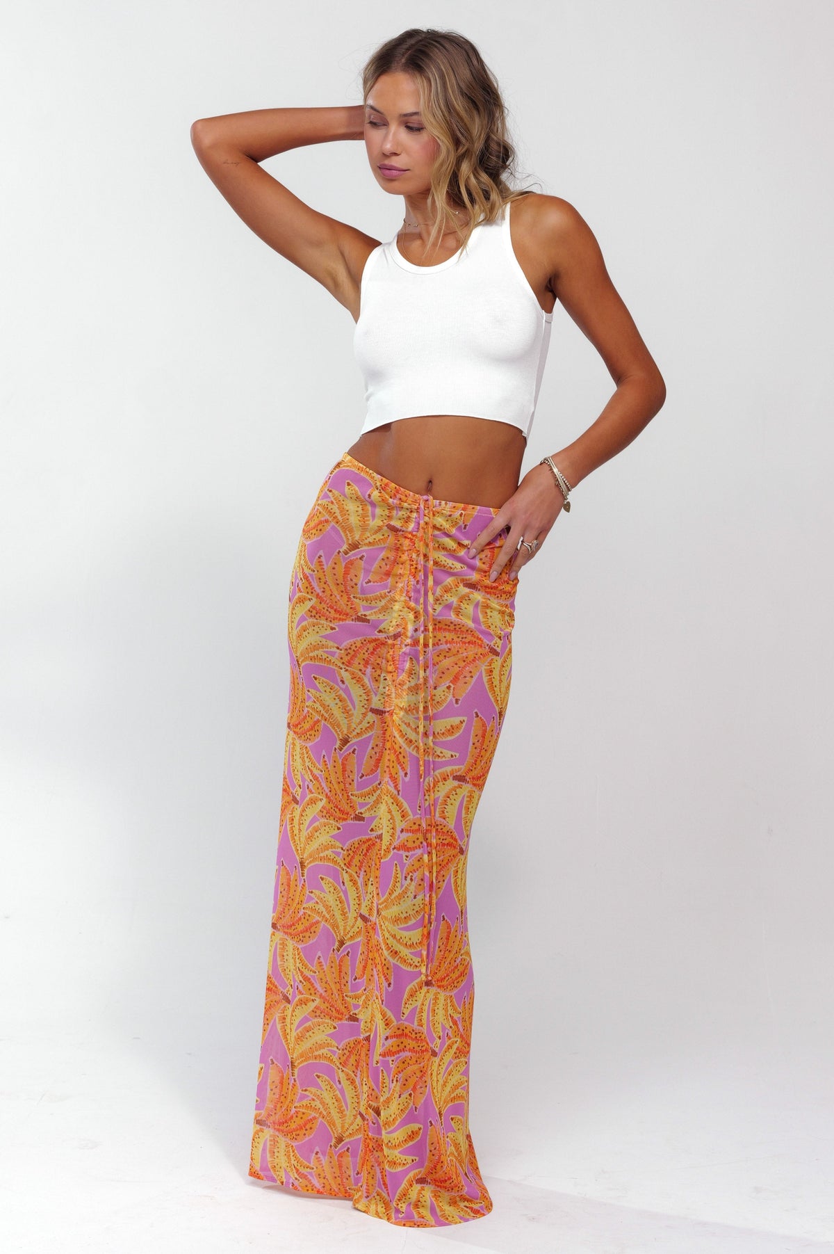 This is an image of Ziggy Mesh Skirt in Chiquita - RESA featuring a model wearing the dress