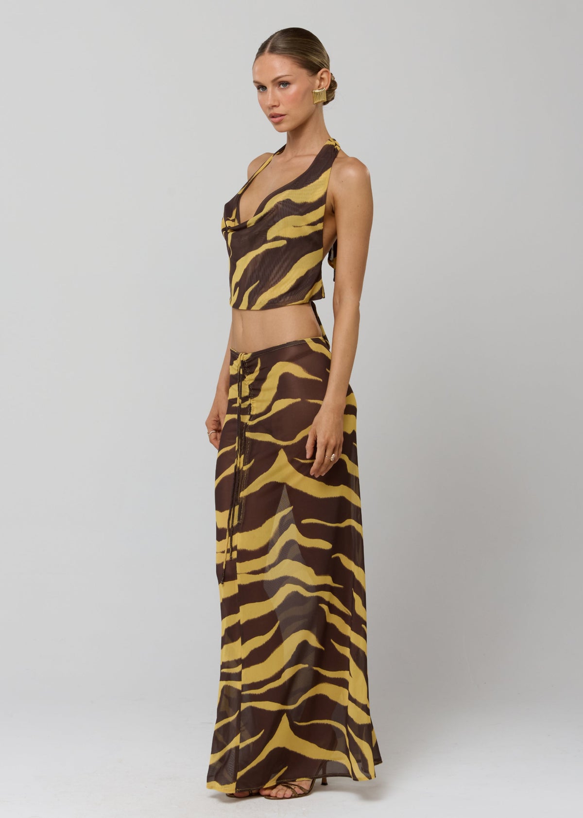 This is an image of Ziggy Mesh Skirt in Raja - RESA featuring a model wearing the dress