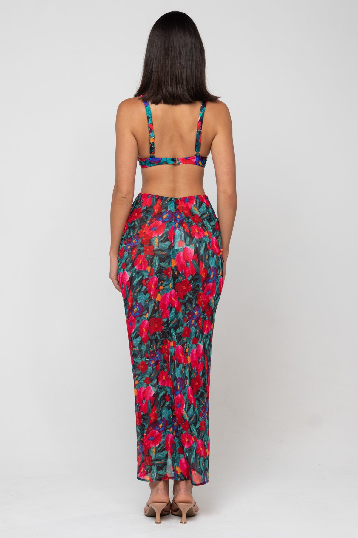 This is an image of Ziggy Mesh Skirt in Resort - RESA featuring a model wearing the dress
