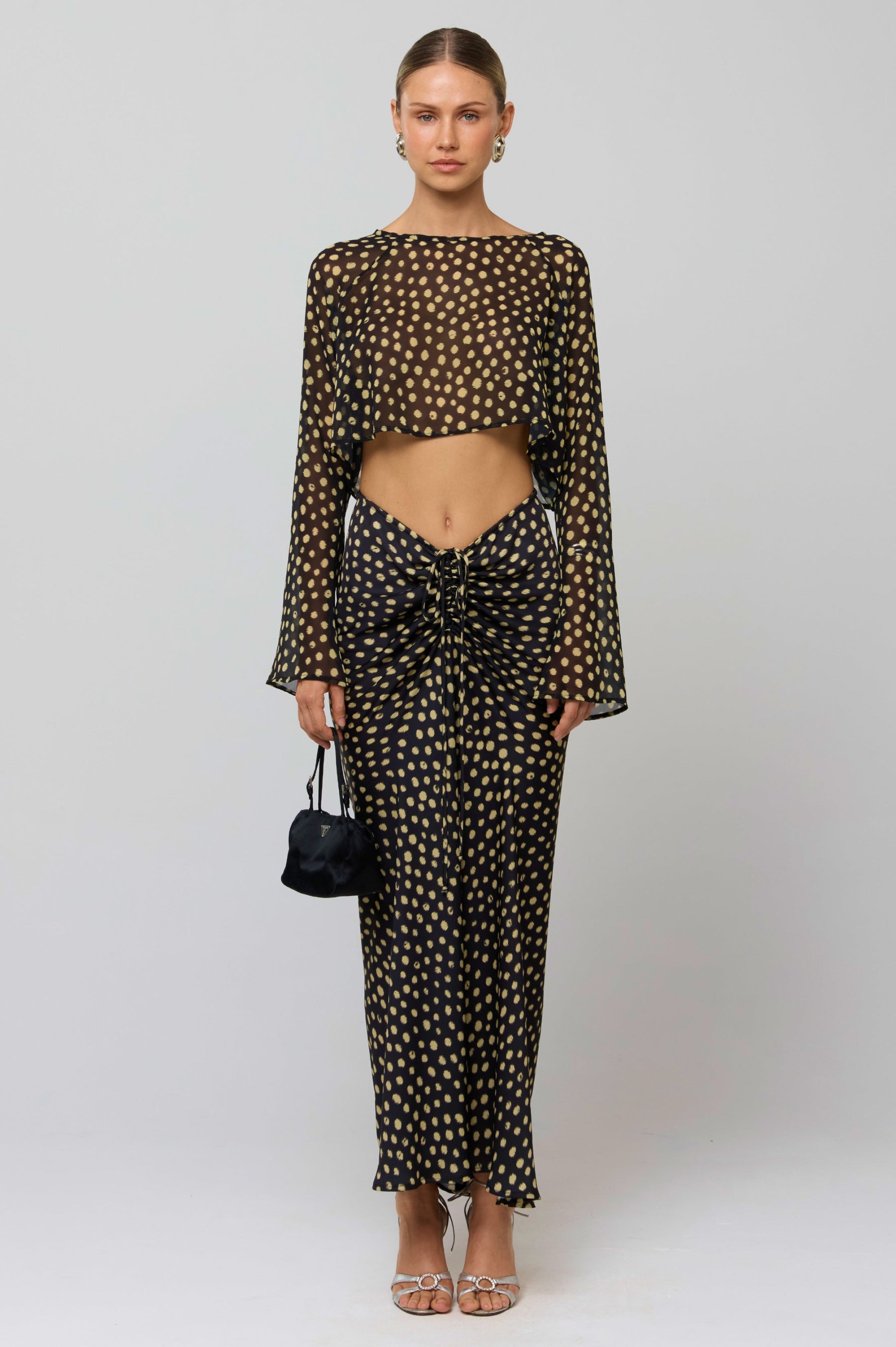 This is an image of Ziggy Skirt in Celeste - RESA featuring a model wearing the dress