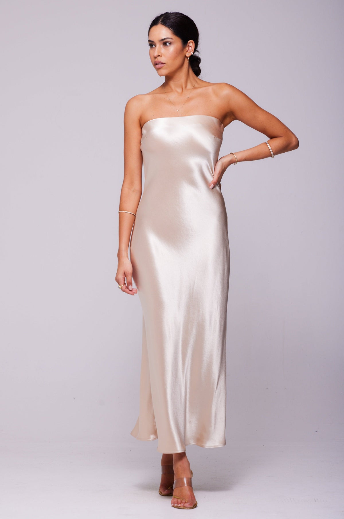 This is an image of Anna Slip in Champagne - RESA featuring a model wearing the dress