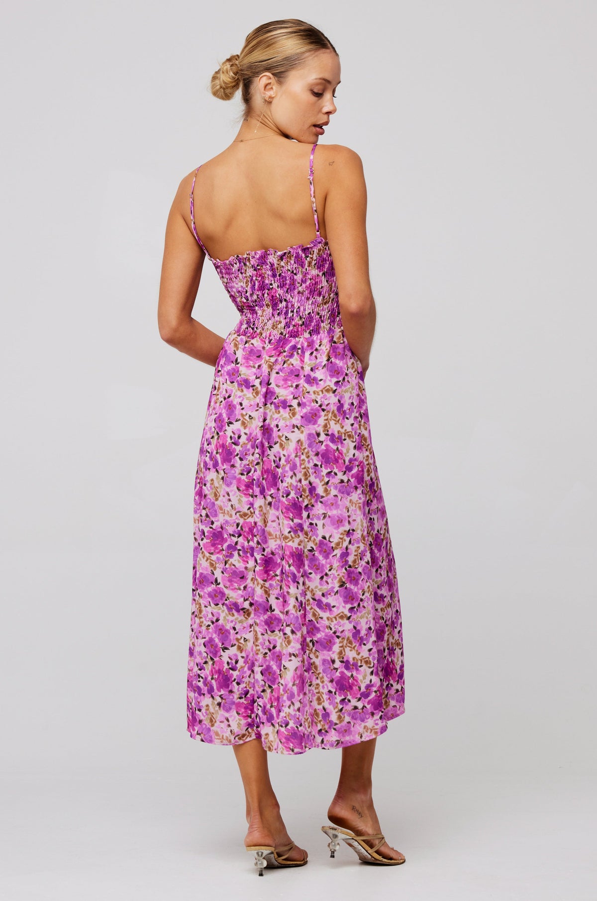 This is an image of Ashley Midi in Lilac - RESA featuring a model wearing the dress