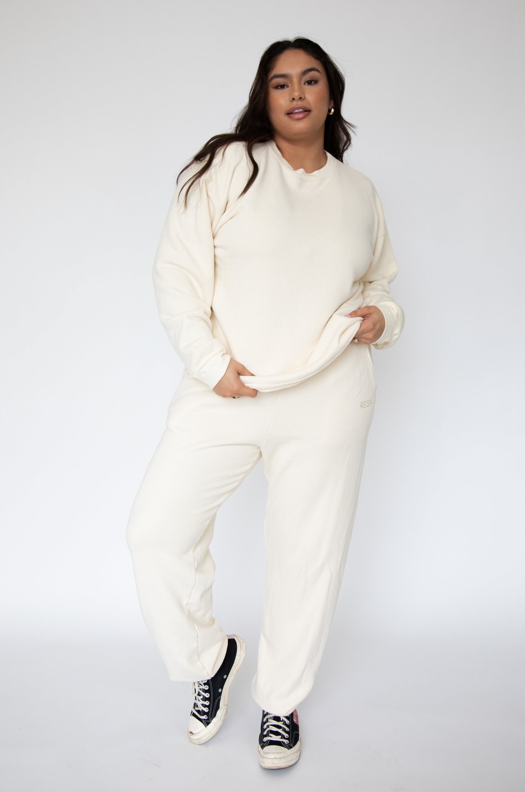 This is an image of Bodhi Sweat pants in Bone - RESA featuring a model wearing the dress