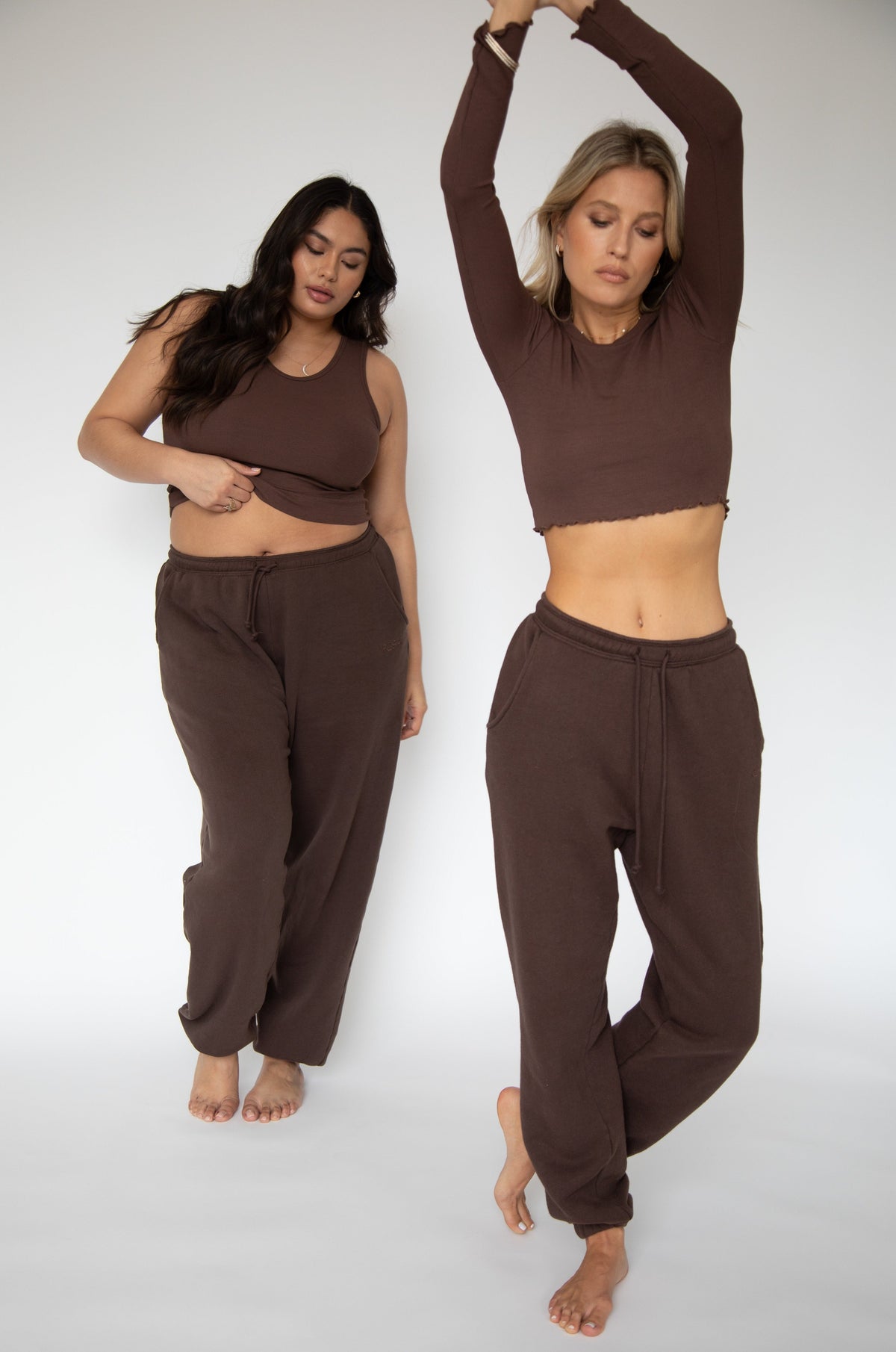 This is an image of Bodhi Sweat pants in Tobacco - RESA featuring a model wearing the dress