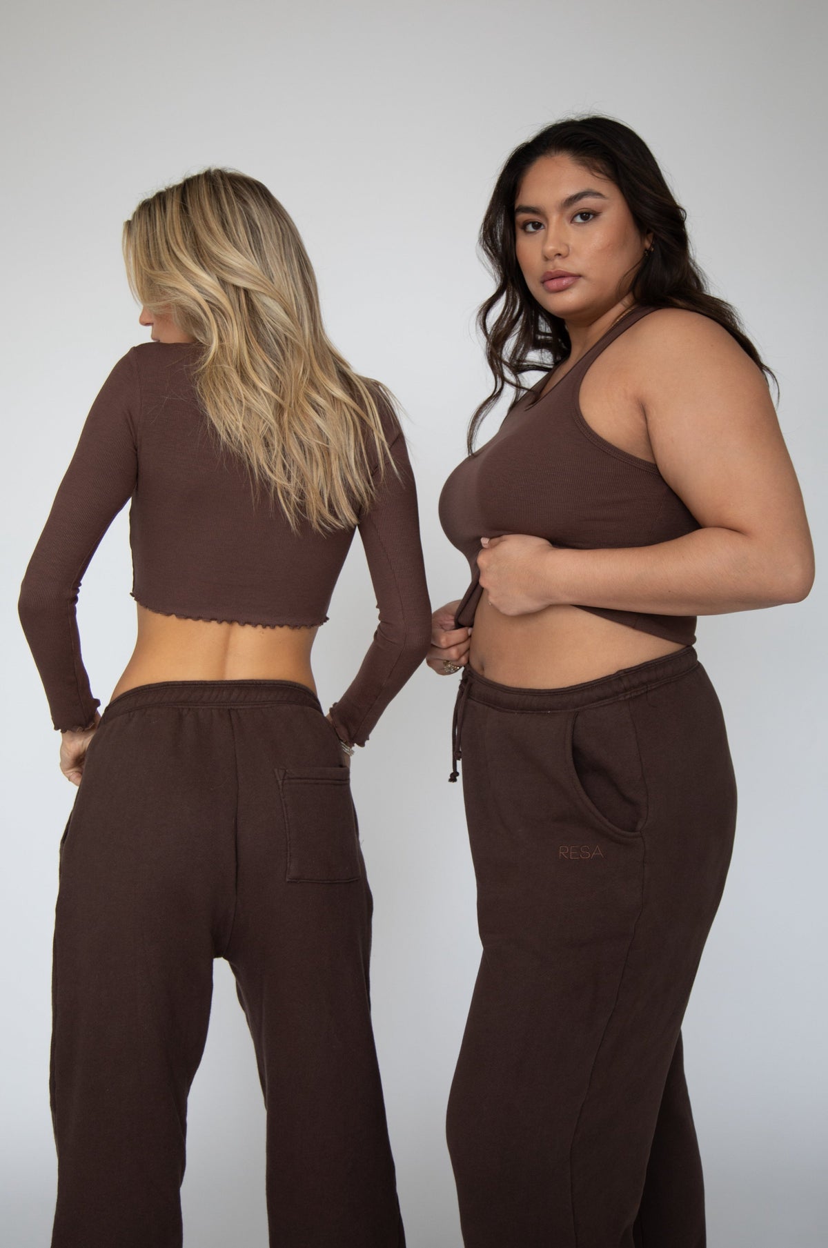 This is an image of Bodhi Sweat pants in Tobacco - RESA featuring a model wearing the dress