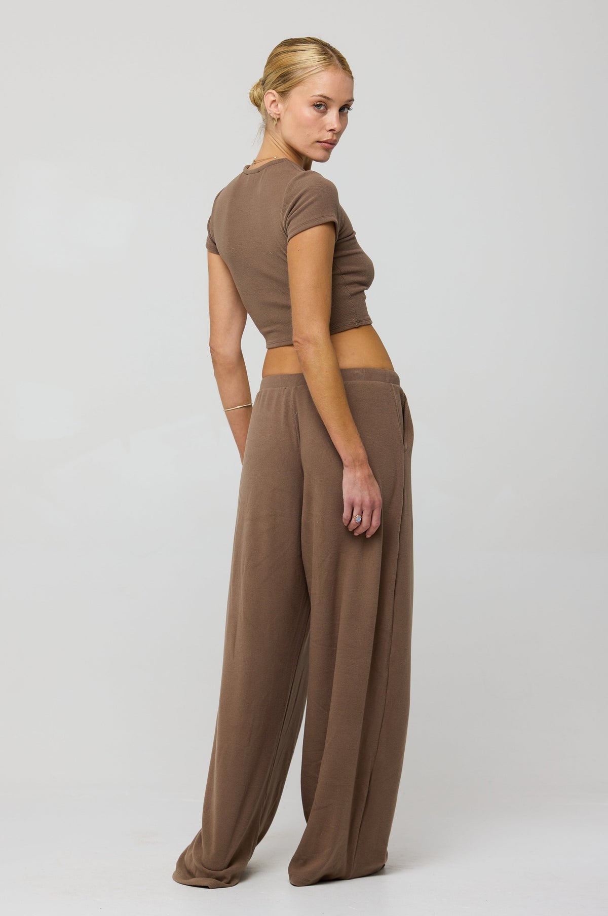 This is an image of Chase Rib Pant in Chai - RESA featuring a model wearing the dress