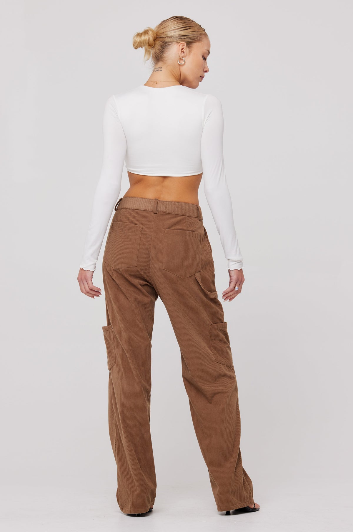 This is an image of Elsa Cargo Pant in Espresso - RESA featuring a model wearing the dress