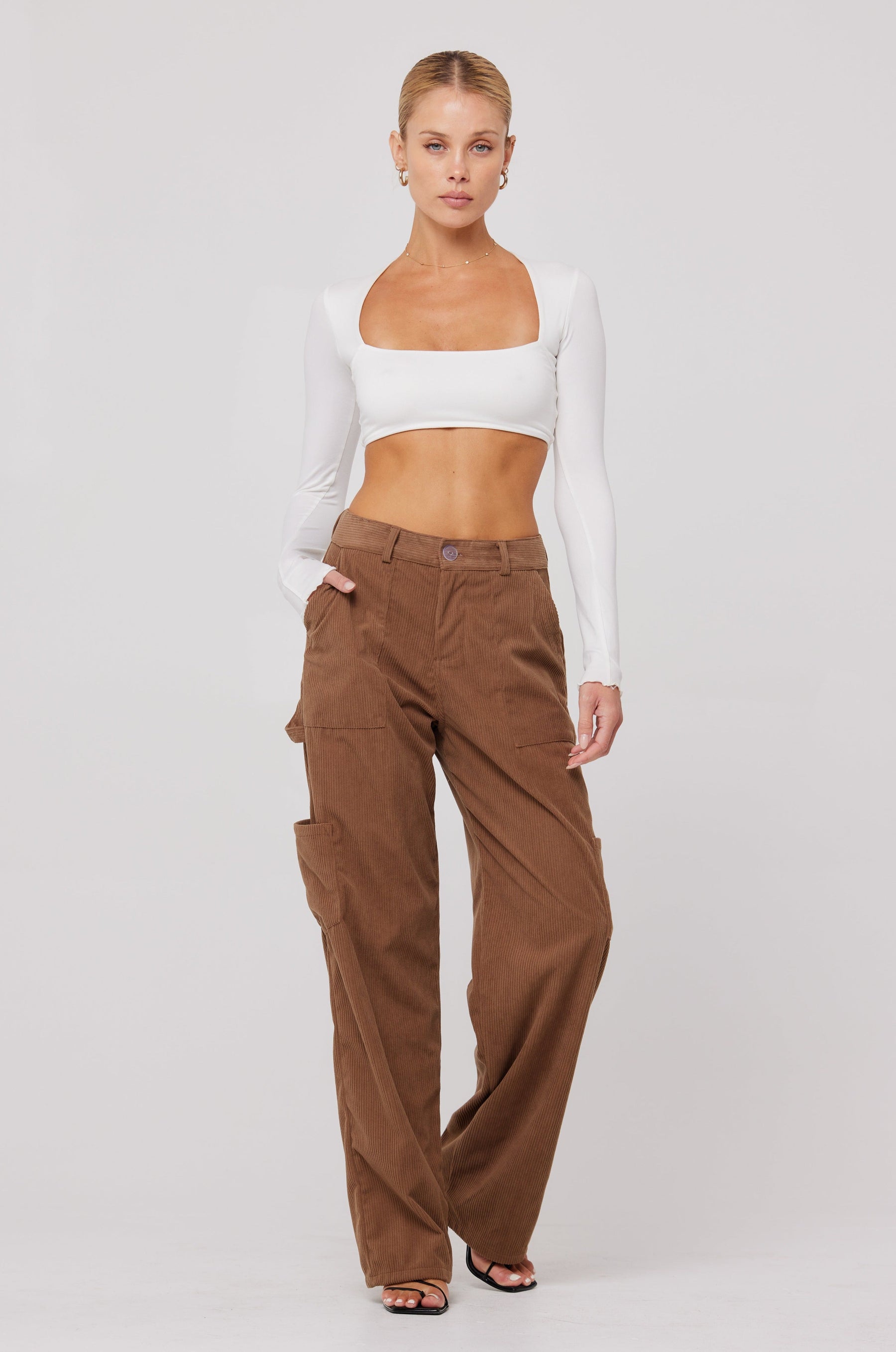 This is an image of Elsa Cargo Pant in Espresso - RESA featuring a model wearing the dress