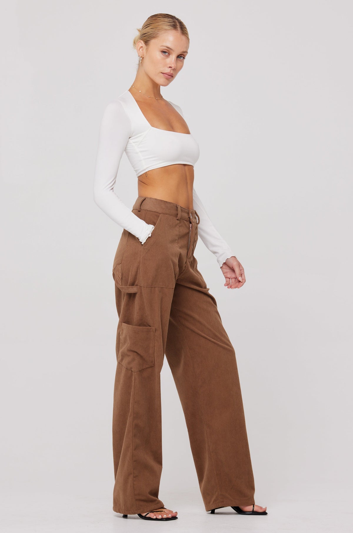 This is an image of Elsa Cargo Pant in Espresso - RESA featuring a model wearing the dress