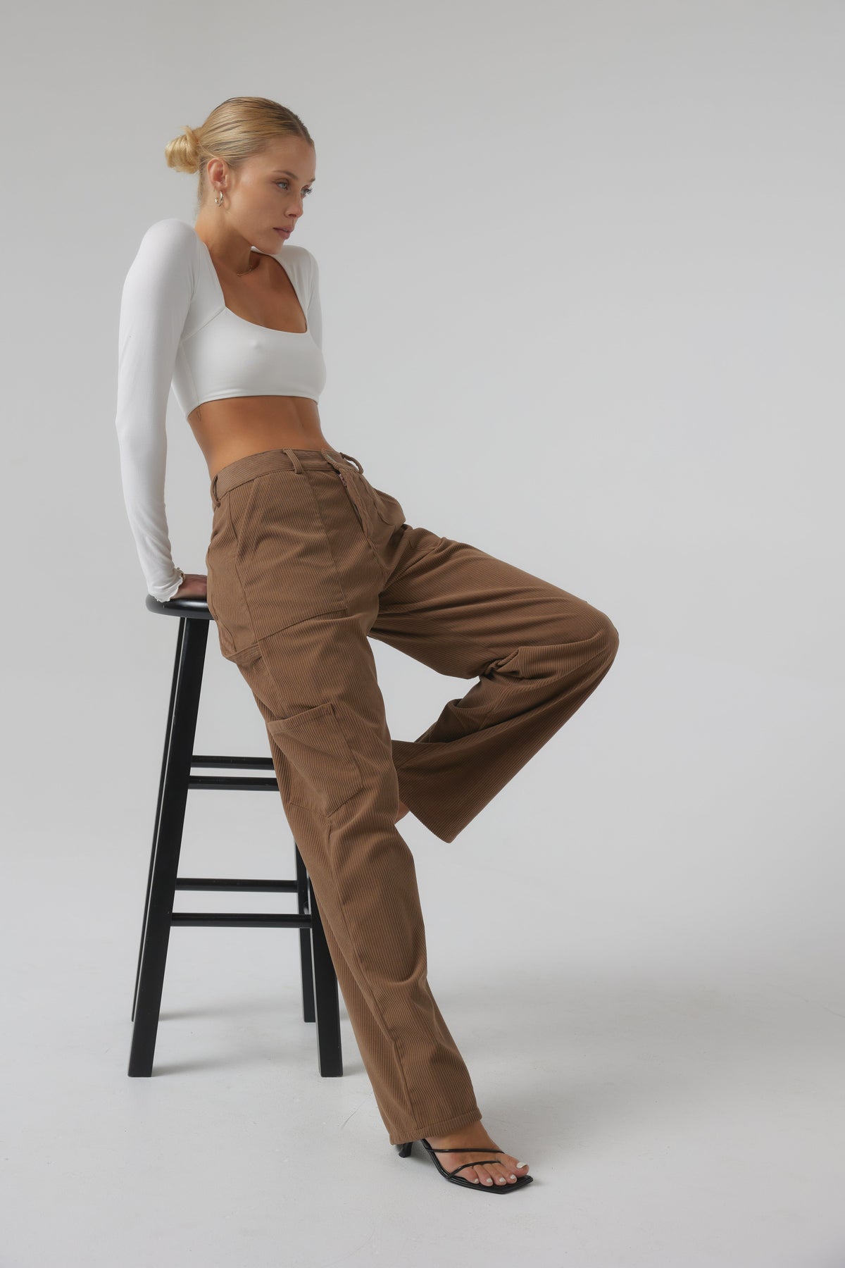 This is an image of Elsa Cargo Pant in Espresso - RESA featuring a model wearing the dress