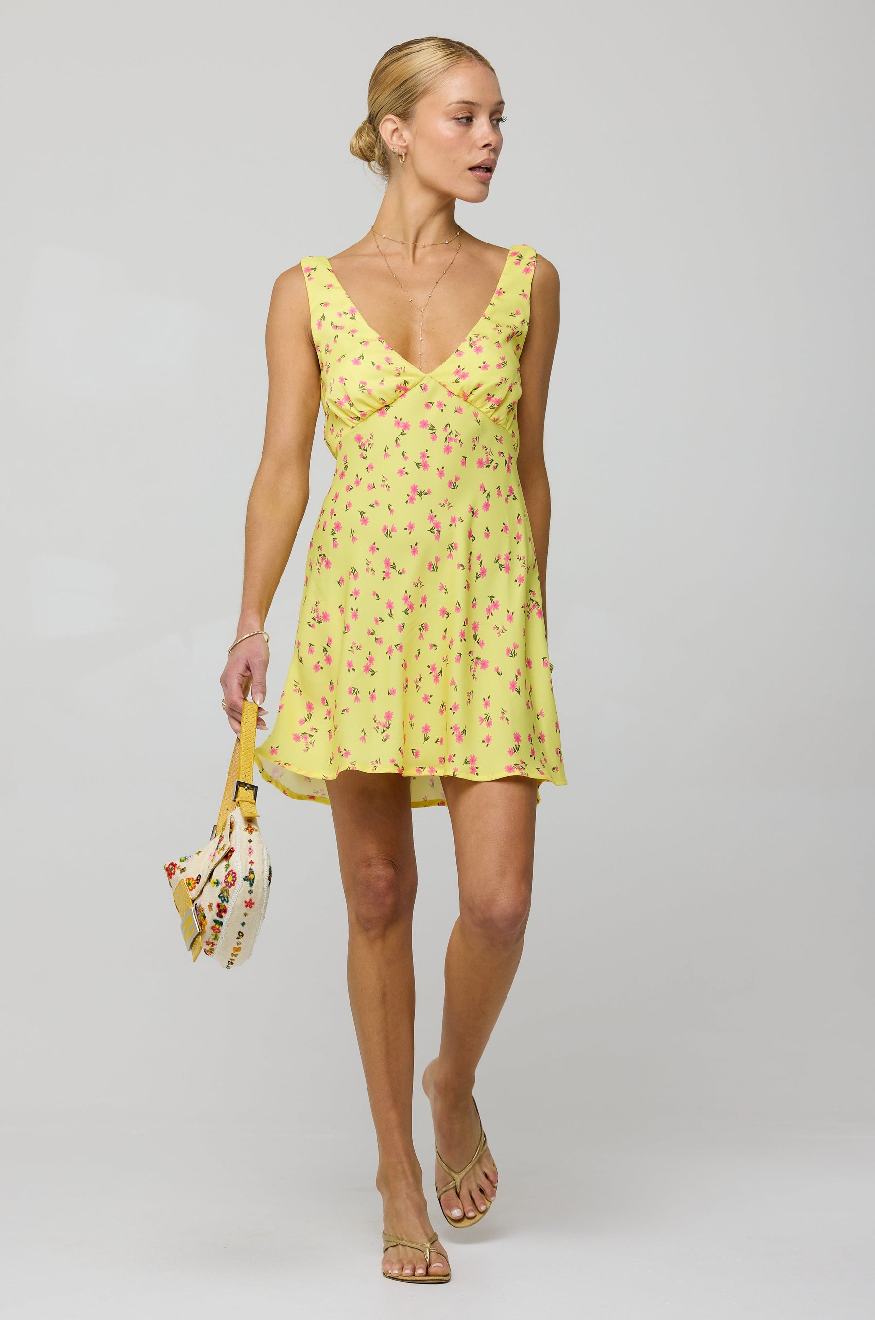 This is an image of Frankie Mini in Honey - RESA featuring a model wearing the dress