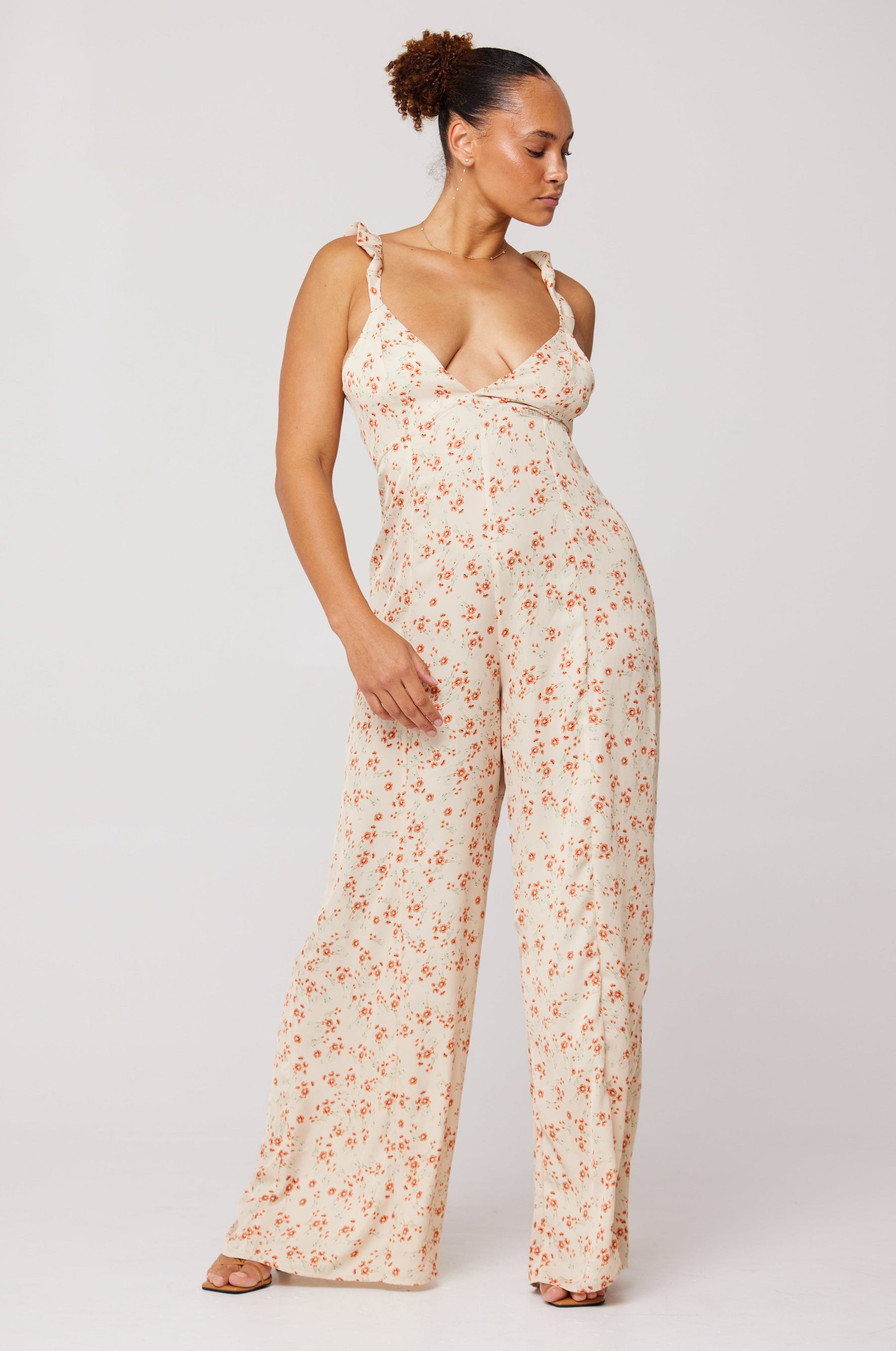 This is an image of Jilly Jumpsuit in Wildflower - RESA featuring a model wearing the dress