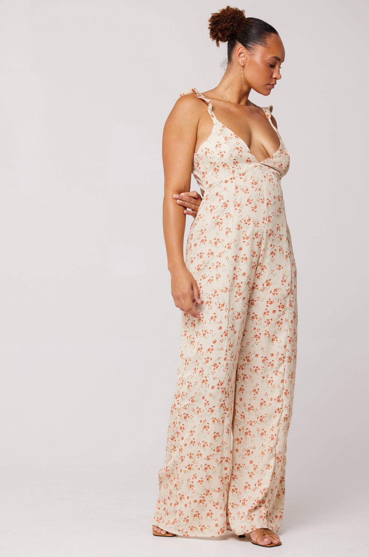 This is an image of Jilly Jumpsuit in Wildflower - RESA featuring a model wearing the dress