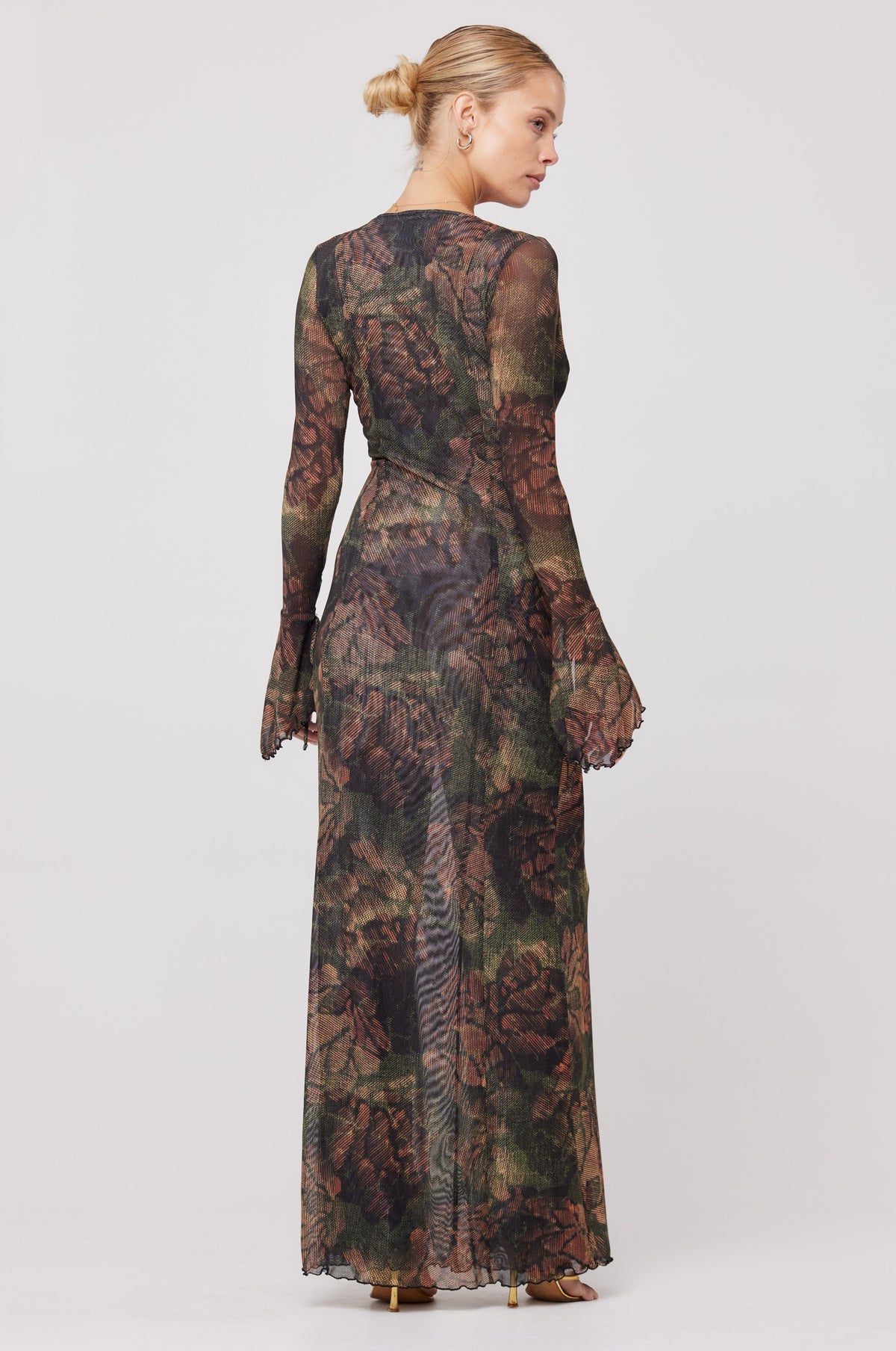 This is an image of Lennon Maxi Dress in Autumn - RESA featuring a model wearing the dress