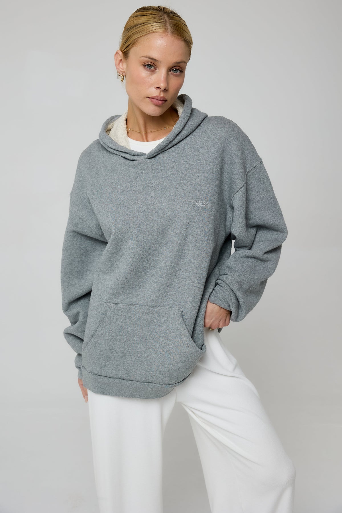 This is an image of Leo Hoodie in Grey - RESA featuring a model wearing the dress