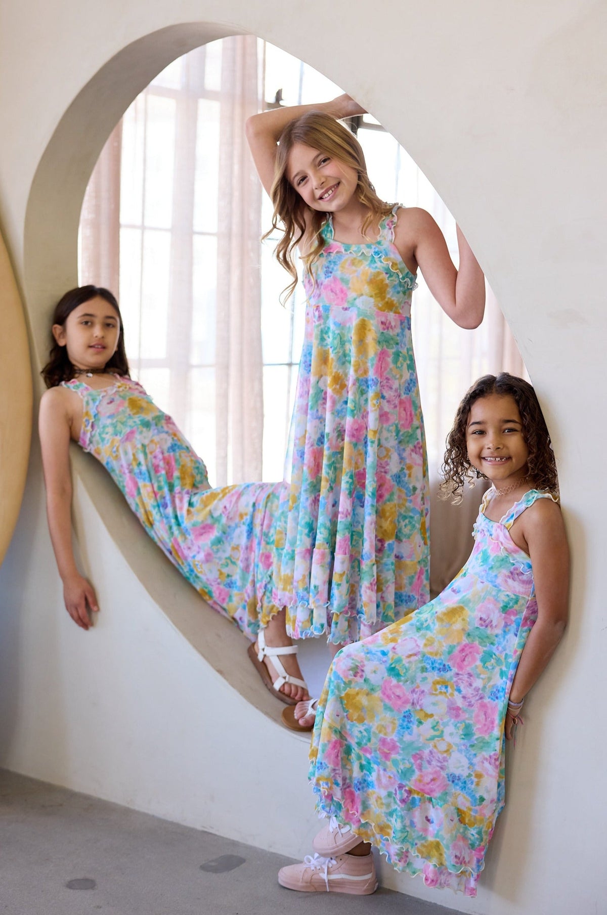 This is an image of Missy Kids in Canvas - RESA featuring a model wearing the dress