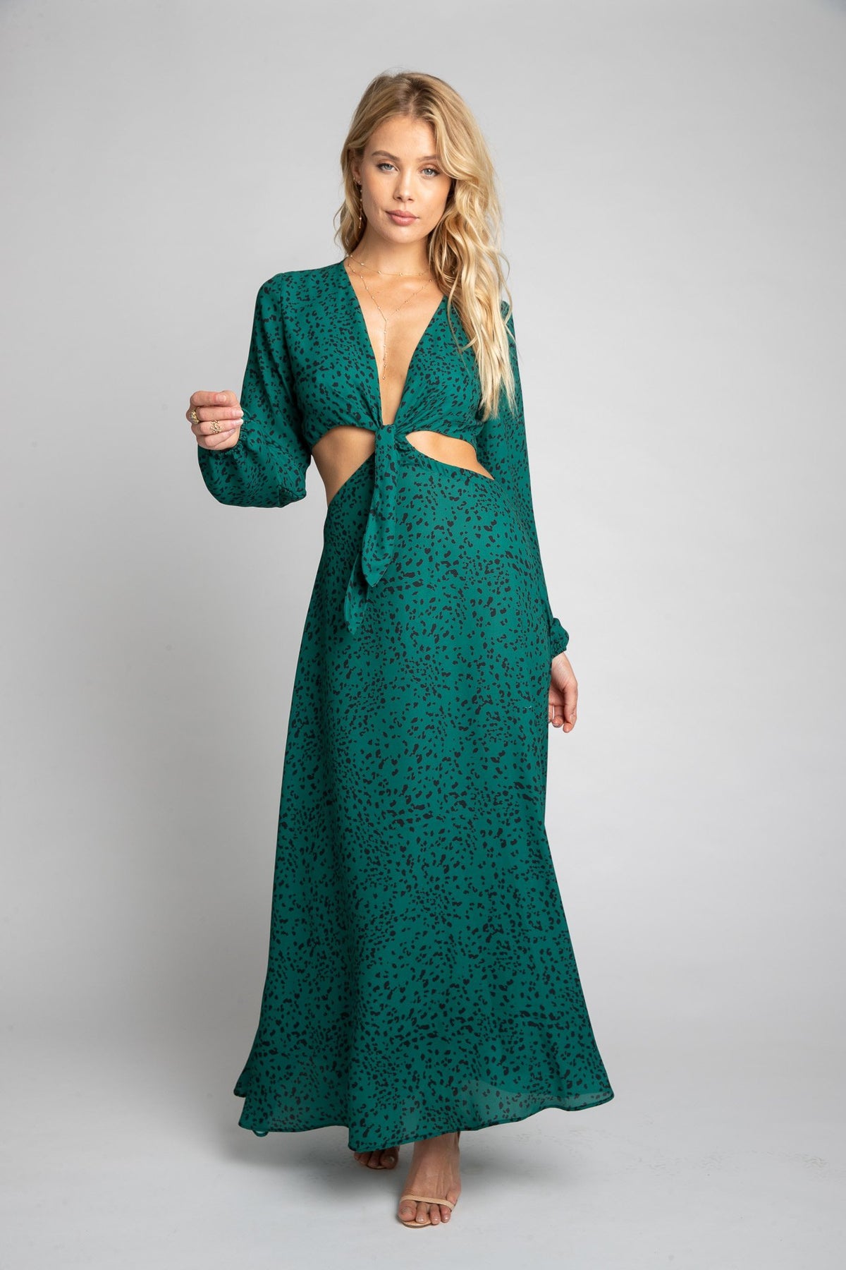 This is an image of Noelle Maxi - RESA featuring a model wearing the dress