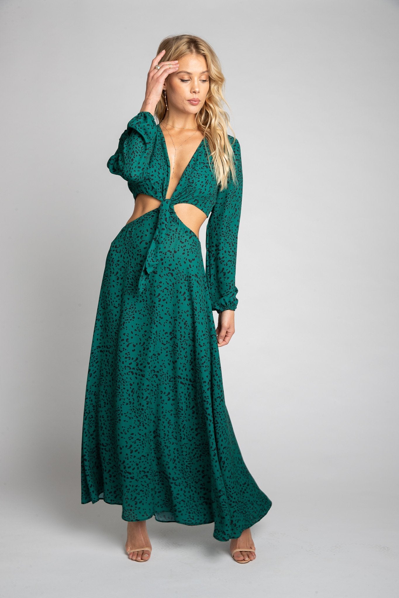 This is an image of Noelle Maxi - RESA featuring a model wearing the dress