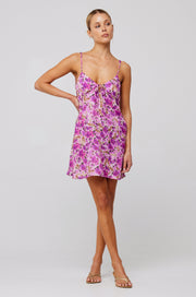 This is an image of Penny Mini in Lilac - RESA featuring a model wearing the dress