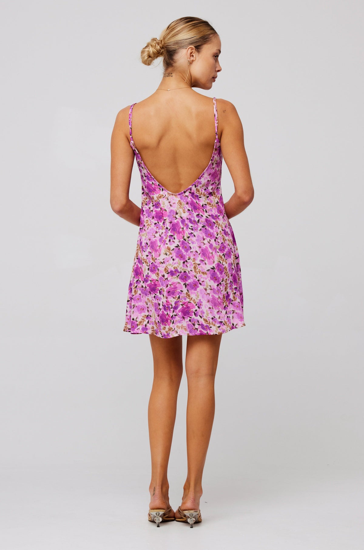 This is an image of Penny Mini in Lilac - RESA featuring a model wearing the dress