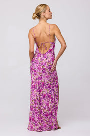 This is an image of River Slip in Lilac - RESA featuring a model wearing the dress