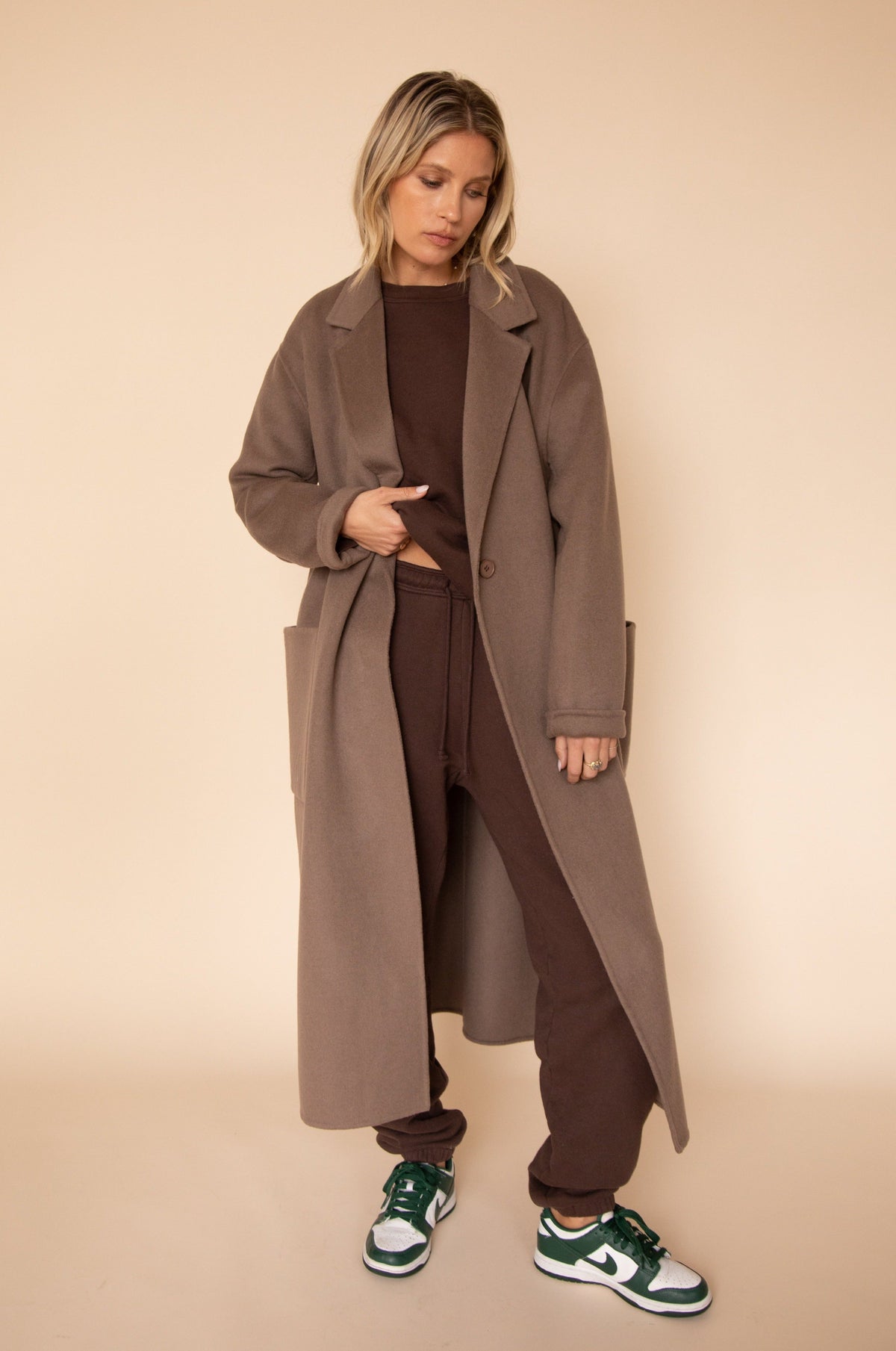 This is an image of Ryder Coat in Taupe - RESA featuring a model wearing the dress