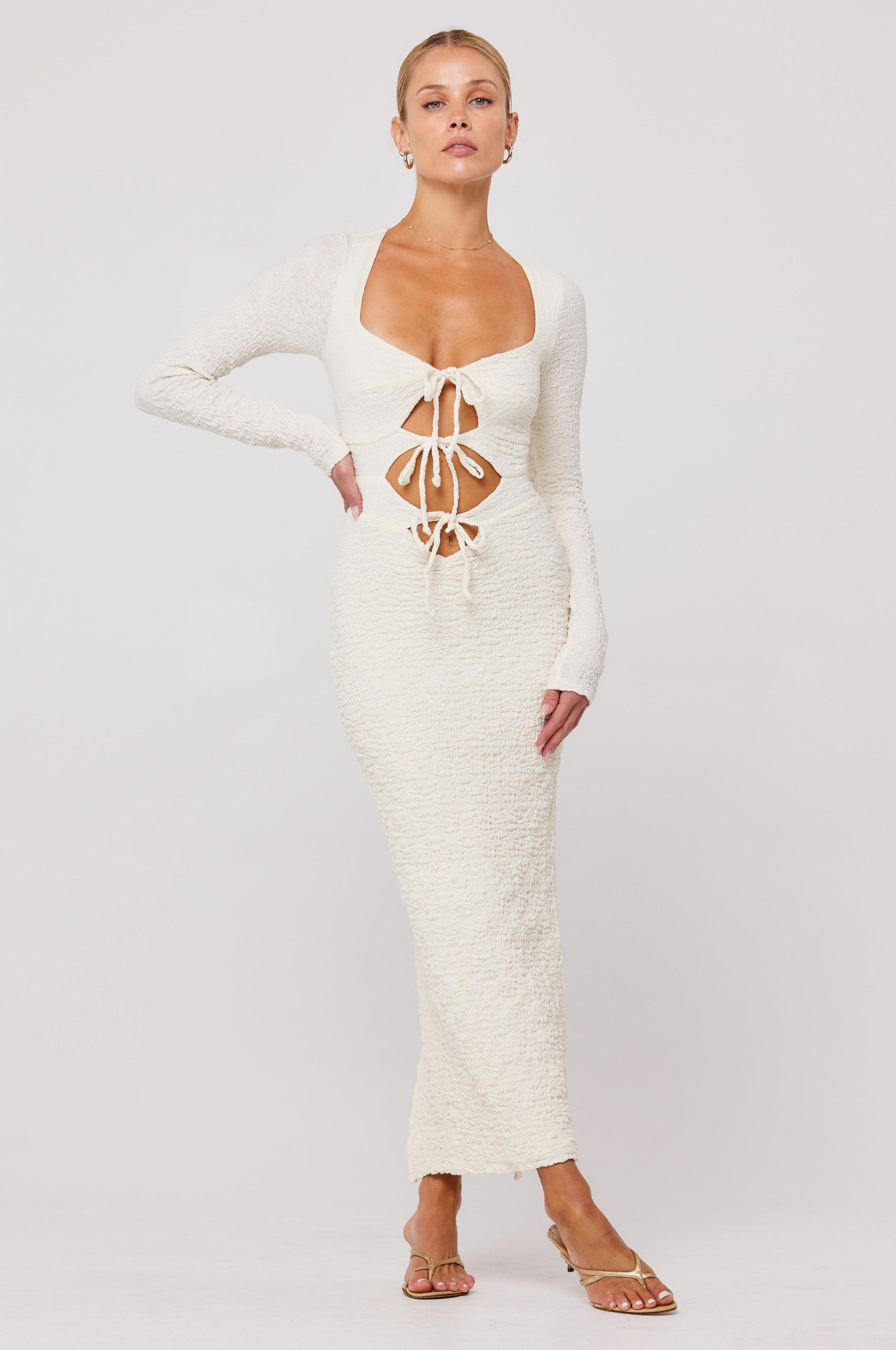 This is an image of Simone Dress in Ivory - RESA featuring a model wearing the dress