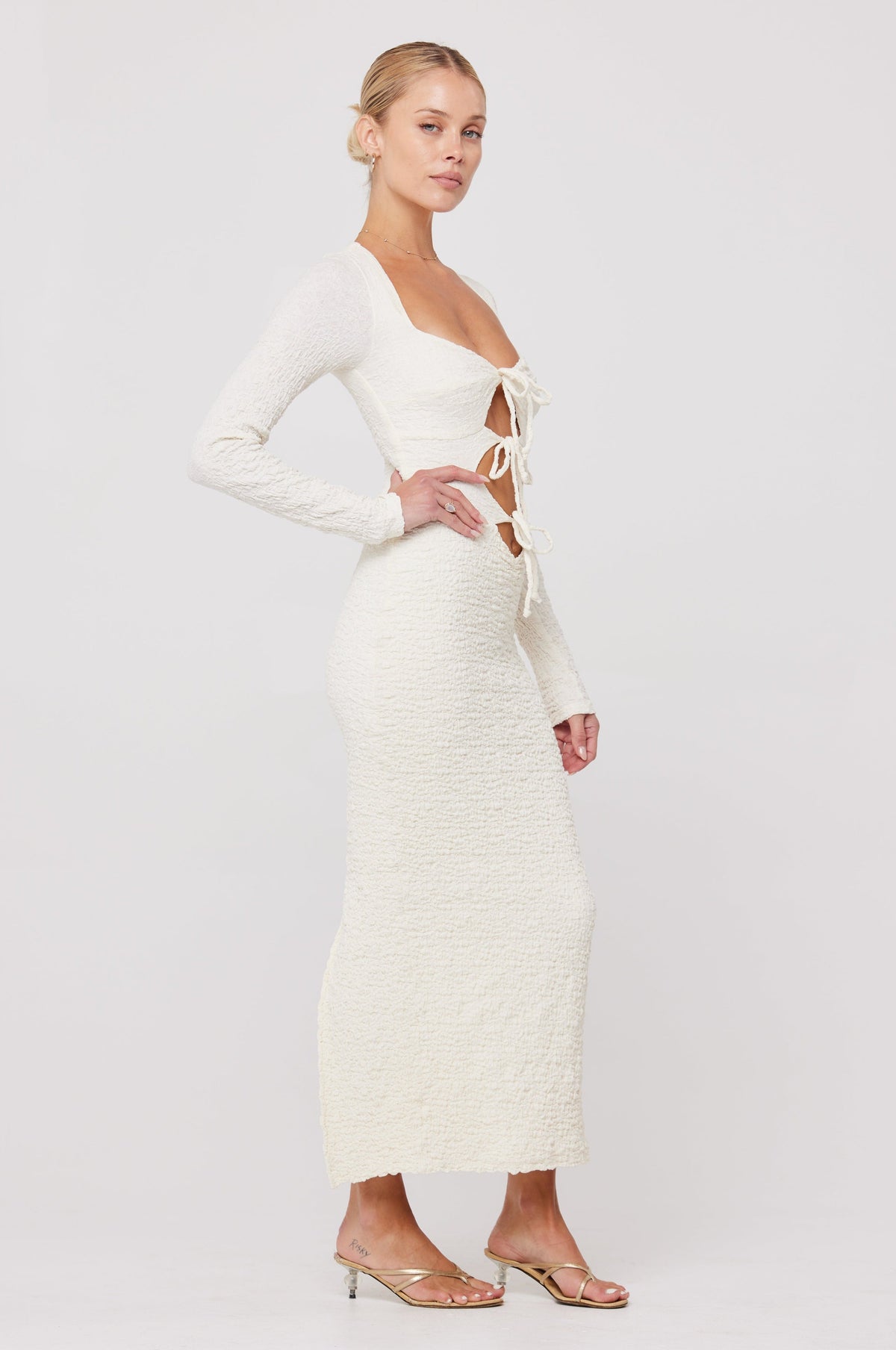 This is an image of Simone Dress in Ivory - RESA featuring a model wearing the dress