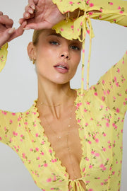 This is an image of Sloane Mini in Honey - RESA featuring a model wearing the dress