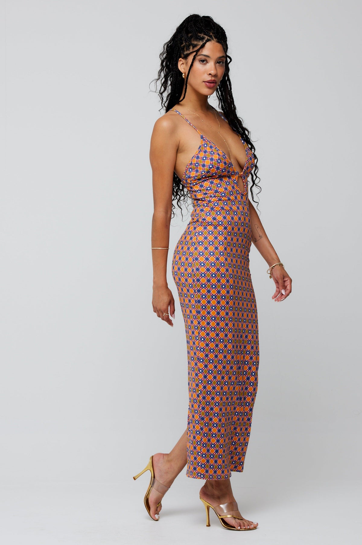 This is an image of Sophia Midi in Cortez - RESA featuring a model wearing the dress