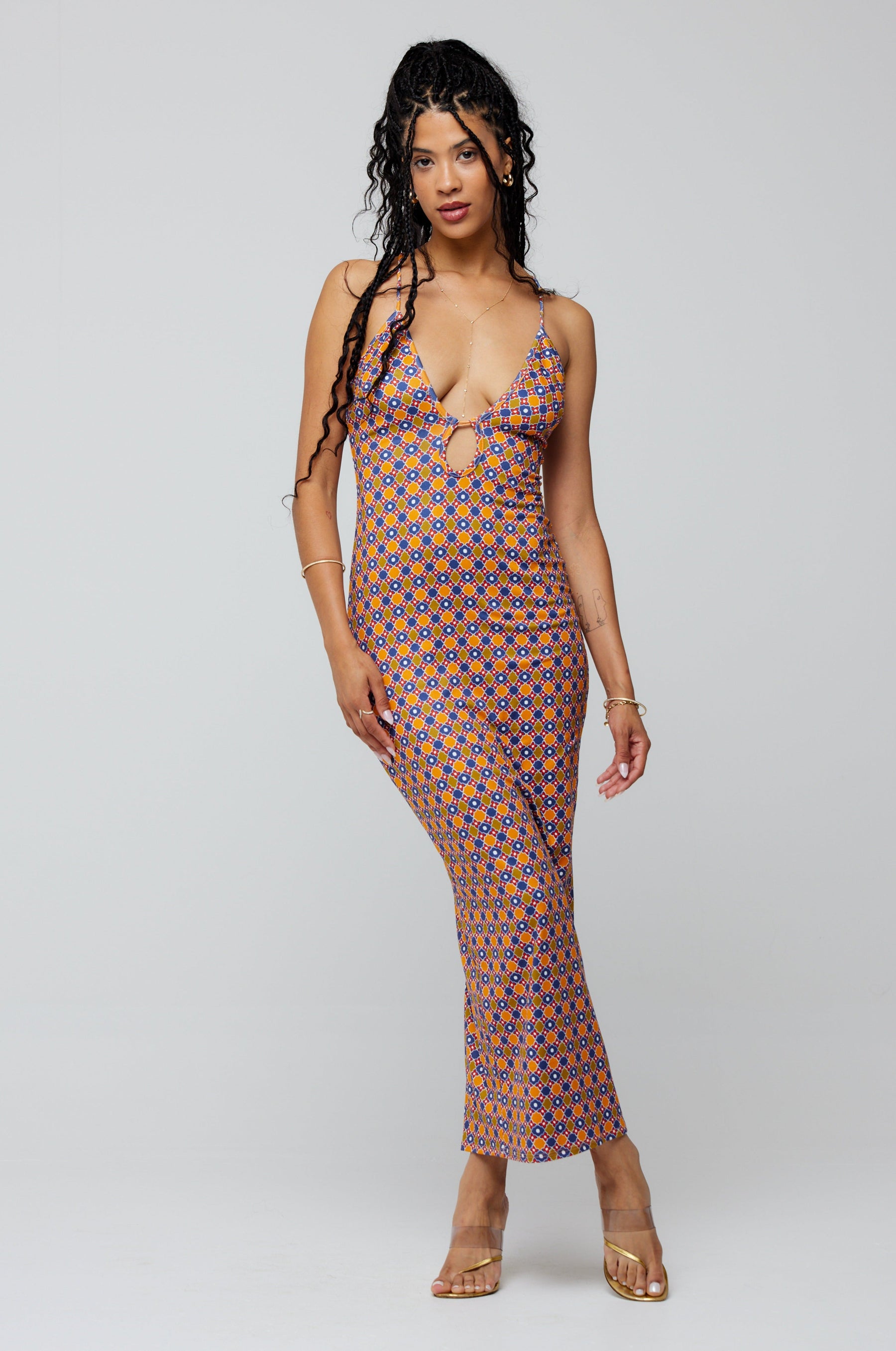 This is an image of Sophia Midi in Cortez - RESA featuring a model wearing the dress