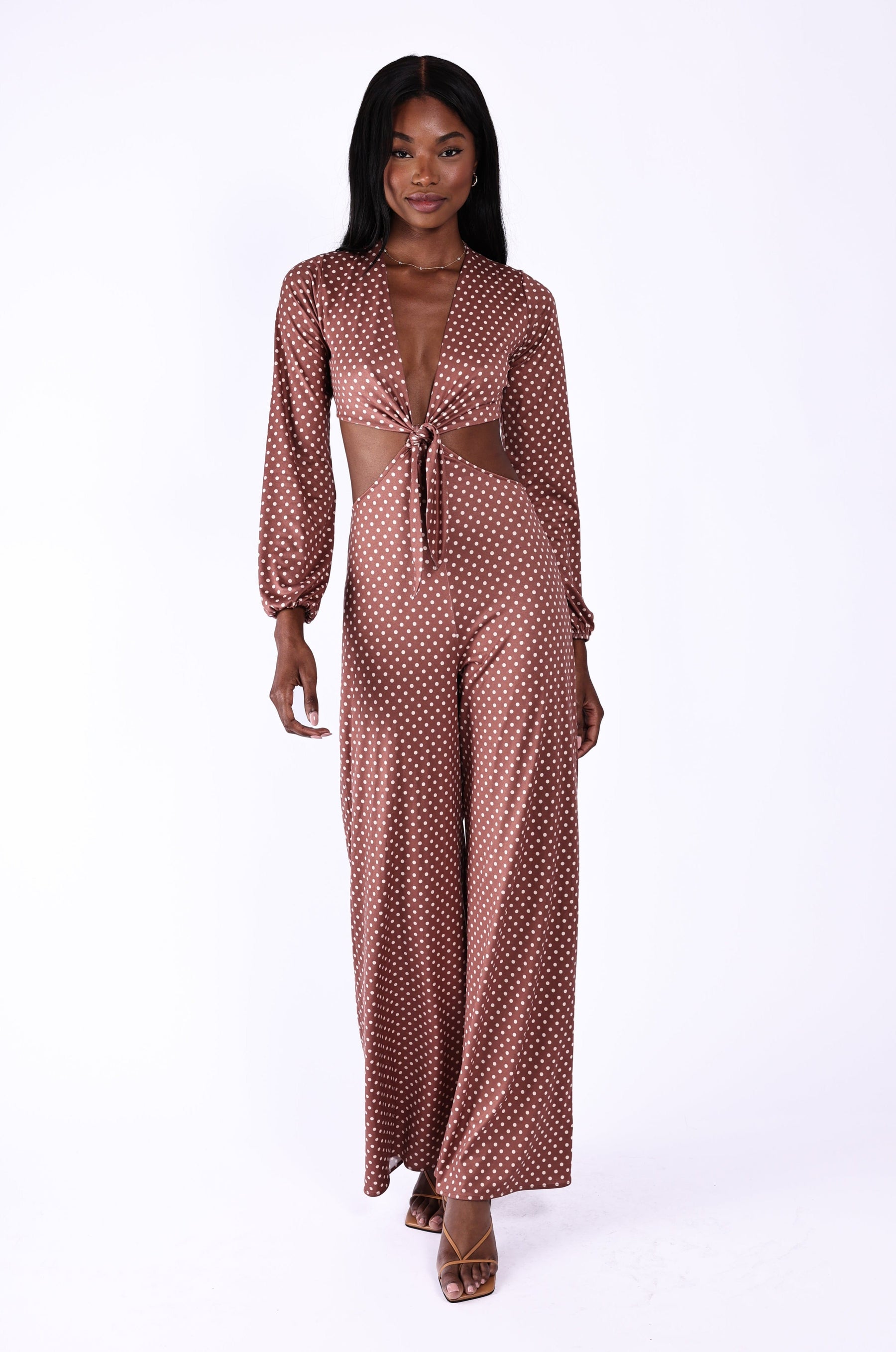 This is an image of Zoe Jumpsuit - RESA featuring a model wearing the dress