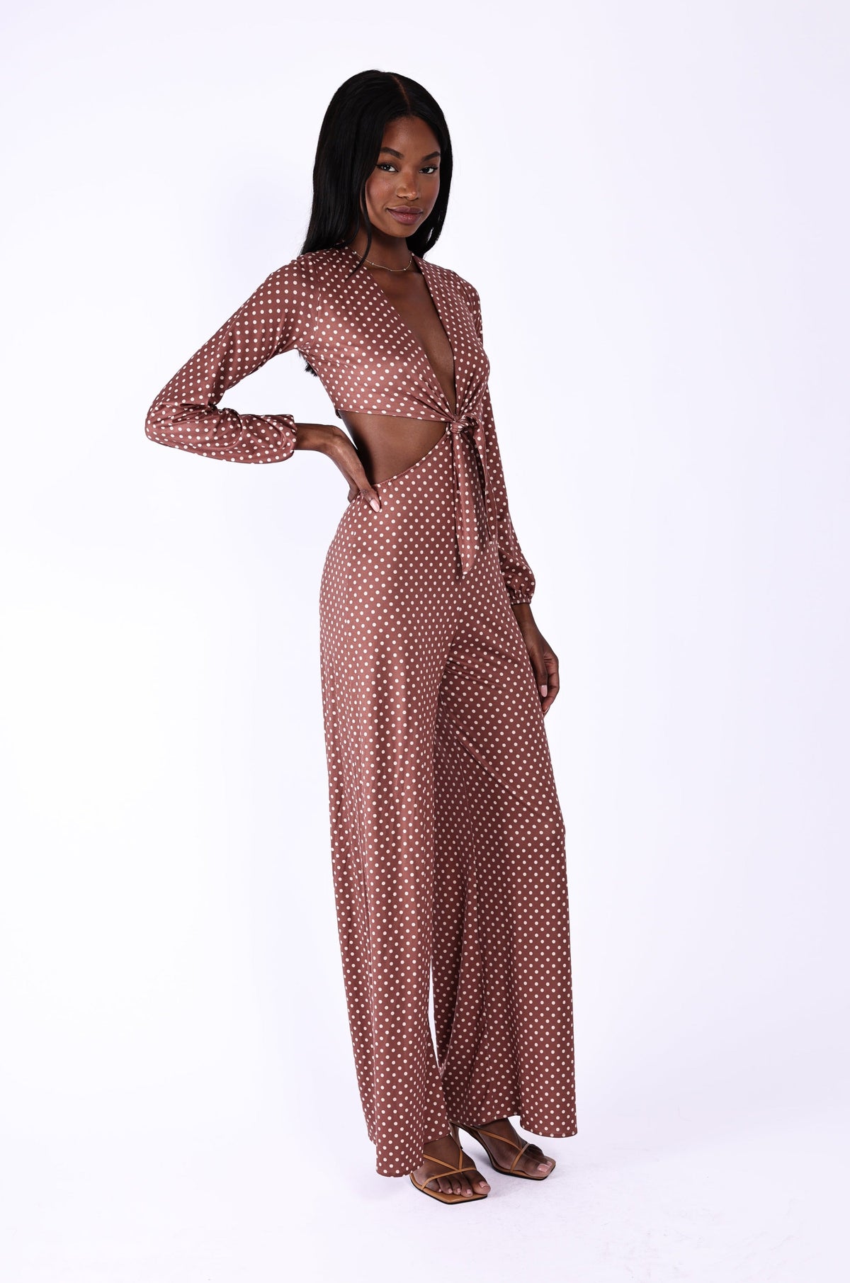 This is an image of Zoe Jumpsuit - RESA featuring a model wearing the dress